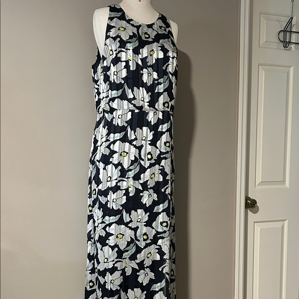 Elegant Floral Maxi Dress in Black and White. Fully lined zippered back.